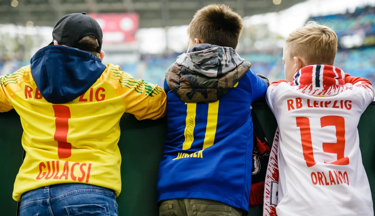 Fans of RB Leipzig are seen prior to during the Bundesliga match between RB Leipzig and VfL Wolfsburg at Red Bull Arena on October 19, 2019 in Leipzig, Germany. (Photo by Reinaldo Coddou H./Bundesliga/Bundesliga Collection via Getty Images)