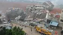 Kondisi usai longsor di sebuah kawasan industri  di Shenzhen, provinsi Guangdong, China selatan, Minggu (20/12). Menurut media setempat, longsor tersebut merobohkan 22 bangunan dan mengakibatkan 59 orang hilang. (CHINA OUT AFP PHOTO)