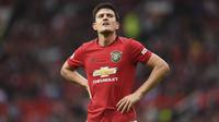 Pemain baru MU, Harry Maguire tampil gemilang di laga lawan Chelsea, Minggu (11/8). (Oli SCARFF / AFP)