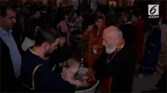 Gereja Katedral di Tbilisi, Georgia, gelar upacara baptis massal.