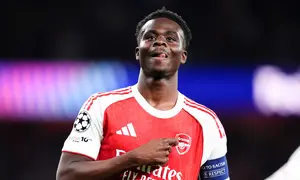 Pemain Arsenal, Bukayo Saka, melakukan selebrasi setelah mencetak gol ke gawang Atletico Madrid pada laga leg kedua semifinal Liga Champions di Stadion Emirates, Rabu (6/5/2026). (John Walton/PA via AP)