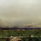 Sumatera bagian selatan (Sumbagsel) darurat kabut asap akibat kebakaran hutan dan lahan (karhutla). Khususnya di Sumatera Selatan dan Jambi. Selain itu, karhutla juga mulai banyak terjadi di Bangka Belitung dan Bengkulu. (Al ZULKIFLI/AFP)