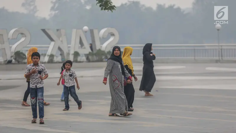Aktivitas Warga Riau Terganggu Akibat Kabut Asap