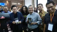Menteri BUMN RI Erick Thohir (kedua kiri) bersama Direktur Utama BRI Sunarso (tengah) dan Wakil Direktur Utama BRI Catur Budi Harto (kanan) serta Direktur Utama Pegadaian Damar Latri Setiawan (kedua kanan) mengunjungi salah satu stan peserta Indonesia Coffee Festival (ICF) and Cafe Brasserie & Expo di JIEXPO Kemayoran Jakarta, Minggu (6/5/2023). (Liputan6.com/HO)