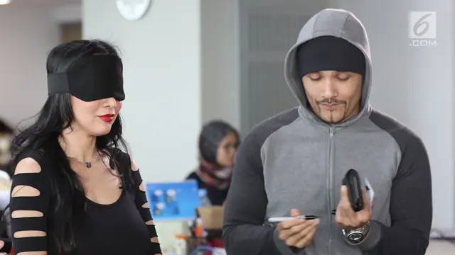 Romy Rafael dan istrinya, Ury Kartha