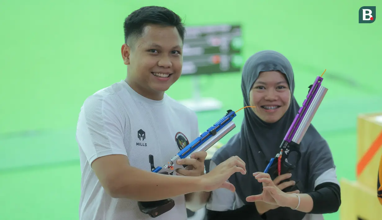Berlaga di Shooting Racne Sports Authority of Thailand, Iqbal/Arista sukses berhasil membekuk wakil Vietnam, Trinh Thu Vinh/Pham Quang Huy, dengan skor 17-9. (Bola.com/Bagaskara Lazuardi)
