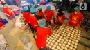 Kue Keranjang merupakan salah satu makanan khas yang dianggap wajib tersedia dalam perayaan Tahun Baru Imlek. Dalam bahasa Mandarin, Kue Keranjang disebut Nian Gao. (merdeka.com/Arie Basuki)