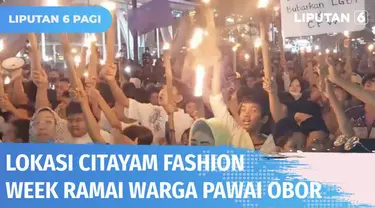 Pawai obor menyambut Tahun Baru Hijriyah menghiasi Ibu Kota sepanjang Jumat (29/07) malam. Tidak terkecuali di wilayah Dukuh Atas yang belakangan terkenal dengan Citayam Fashion Week-nya.