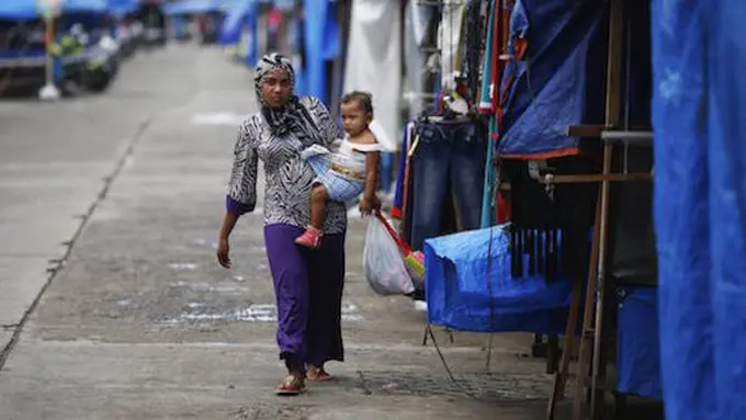 Perempuan Aceh (copyright: The Conversation Indonesia)