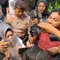 Kepada Dinas Kesehatan (Kandinkes) Lampung, Reihana, usai diperiksa Komisi Pemberantasan Korupsi (KPK), Senin (22/5/2023). (Merdeka/Rahmat B)