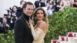 Tom Brady dan  Gisele Bundchen pada Jumat (28/10/2022), mengunggah pernyataan yang mirip di Instagram, bahwa mereka telah mencapai kesepakatan untuk bercerai. (Photo by Charles Sykes/Invision/AP, File)