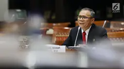 Calon hakim agung Abdul Manaf saat mengikuti uji kelakayan dan kepatutan dengan Komisi III DPR RI, Jakarta, Selasa (10/7). Abdul Manaf merupakan mantan Dirjen Badan Peradilan Agama. (Liputan6.com/JohanTallo)