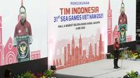Menteri Pemuda dan Olahraga, Zainudin Amali, memberikan sambutan dalam acara pengukuhan atlet SEA Games 2021. (Bola.com/M Iqbal Ichsan)