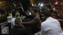 Suasana kegaduhan di depan Gedung KPK, Jakarta, Senin (6/7/2015). Massa pendukung Budi Antoni Aljufri dan Suzanna melakukan pemukulan kepada wartawan yang sedang meliput (Liputan6.com/Helmi Afandi)