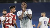 Vinicius Junior. Musim lalu bersama Zinedine Zidane, ia hanya mencetak 6 gol dari 49 laga. Bersama Carlo Ancelotti ia telah mencetak 5 gol hanya dari 6 laga. Kepercayaan Don Carlo yang memberinya kebebasan beroperasi di sektor sayap adalah kunci peningkatan performanya. (AP/Manu Fernandez)