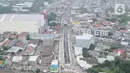 Foto udara menunjukkan suasana Jalan Underpass Dewi Sartika di Depok, Jawa Barat, Selasa (17/1/2023). 
Underpass ini akan memiliki dua jalur satu arah. (Liputan6.com/Herman Zakharia)