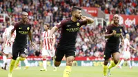 Aguero melakukan selebrasi usai cetak gol (Reuters)