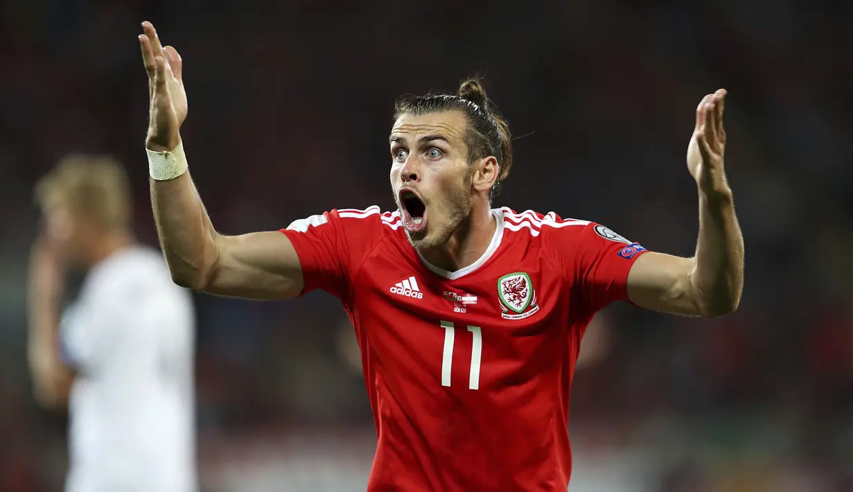 Ekspresi Gareth Bale saat melawan Austria pada laga Group D kualifikasi Piala Dunia 2018 di Cardiff City Stadium, Cardiff, (2/8/2017). Wales menang 1-0. (David Davies/PA via AP)