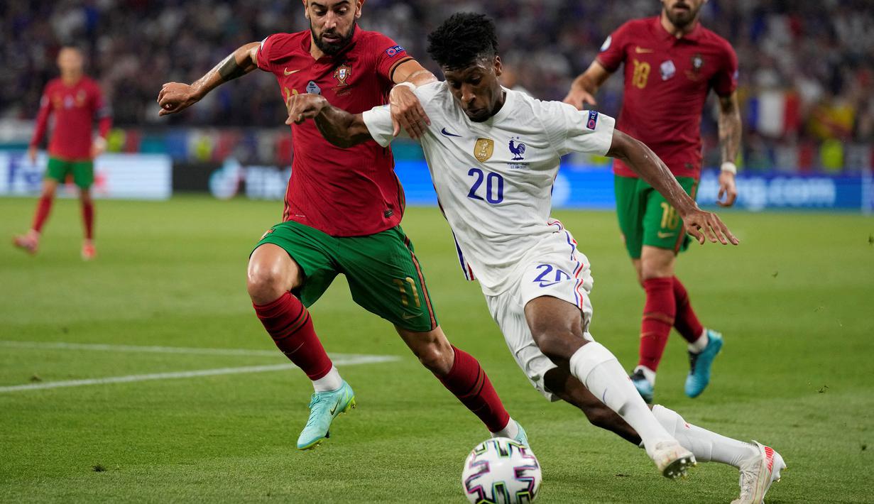 Kingsley Coman adalah pemain Timnas Prancis yang berposisi di sayap kiri ketika Euro 2020. Pemain yang berusia 25 tahun ini dapat menempuh kecepatan 33,7 km/jam ketika berlari. (Foto: AFP/Pool/Darko Bandic)