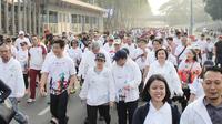Kegiatan Olympic Day Run yang digelar oleh Komite Olimpiade Indonesia bersama Lazada Indonesia di Kompleks GBK, Senayan, Jakarta, Minggu (28/7/2019). (Bola.com/Ist)