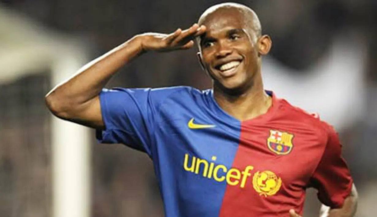 Barcelona's Cameroonian forward Samuel Eto&acute;o celebrates after scoring during a Spanish League football match against Malaga on March 22, 2009 at the Camp Nou stadium in Barcelona. AFP PHOTO/LLUIS GENE 