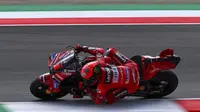 Francesco Bagnaia tampil menggila kala mentas di tanah kelahirannya. (Filippo MONTEFORTE/AFP)