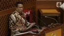 Ketua Baleg DPR Supratman Andi Agtas menyampaikan pandangan fraksi-fraksi terkait RUU Omnibus Law Cipta Kerja saat Rapat Paripurna di Kompleks Parlemen, Jakarta (5/10/2020). Rapat membahas berbagai agenda, salah satunya mengesahkan RUU Omnibus Law Cipta Kerja menjadi UU. (Liputan6.com/JohanTallo)
