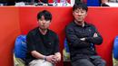 <p>Pelatih Timnas Indonesia, Shin Tae-yong (kanan), berbincang dengan penerjemahnya Jeong Seok-seo, saat menonton laga Grup H Piala Dunia FIBA 2023 antara Kanada melawan Latvia di Indonesia Arena, Senayan, Jakarta, Selasa (29/08/2023). (Bola.com/Bagaskara Lazuardi)</p>