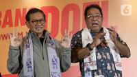 Calon gubernur dan wakil gubernur DKI Jakarta nomor urut 3, Pramono Anung (kiri) bersama Rano Karno saat menyampaikan keterangan terkait hasil hitung cepat pada Pemilihan Kepala Daerah (Pilkada) Serentak 2024 di Jakarta, Rabu (27/11/2024). (Liputan6.com/Herman Zakharia)