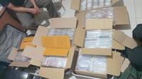 Barang Bukti Ratusan iPhone (Foto: Ajang Nurdin/Liputan6.com)