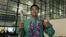 Pemain Timnas Indonesia U-16, David Maulana, berpose saat tiba di Bandara Soekarno Hatta, Tangerang, Kamis (15/3/2018). Timnas Indonesia berhasil menjuarai turnamen Jenesys di Jepang. (Bola.com/M Iqbal Ichsan)