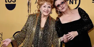 Carrie Fisher dan Debbie Reynolds meninggal di waktu yang berdekatan dan disemayamkan secara bersamaan di rumah duka di kediaman Carrie yang berlokasi di Beverly Hills, California. Prosesi ini dilakukan secara tertutup. (AFP/Bintang.com)