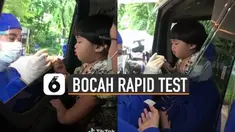 Ekspresi bocah ini saat sedang melakukan rapid test bikin gemes.