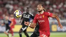 Aksi&nbsp;Cody Gakpo dalam laga pramusim Yokohama F. Marinos vs Liverpool, Rabu (30/7/2025). (AP Photo/Eugene Hoshiko)