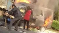 Suami Korbankan Diri Selamatkan Istri dari Kebakaran Mobil. Foto : Shanghaiist