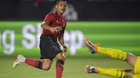Alexis Sanchez mencetak gol untuk MU saat melawan AC Milan (AP Photo/Mark J. Terrill)