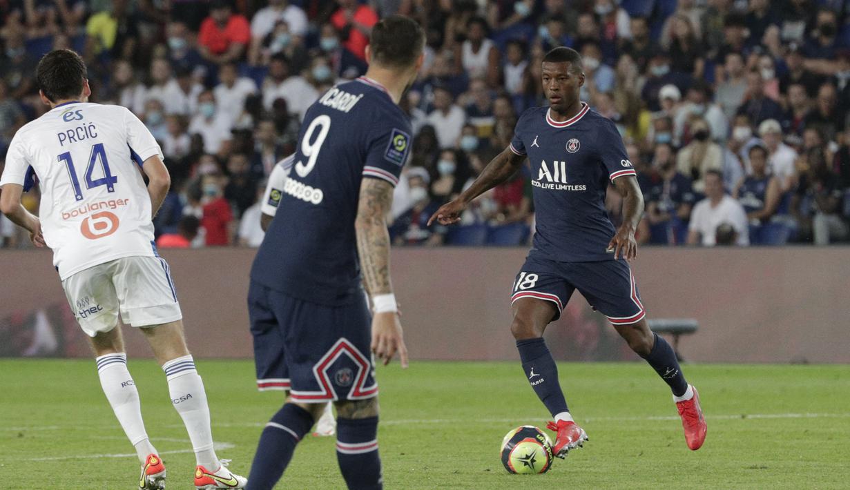 Georginio Wijnaldum. Satu-satunya rekrutan anyar PSG yang diturunkan saat laga perdana melawan Strasbourg. Perannya di lini tengah selama 88 menit turut menjadi andil dalam kemenangan 4-2 tersebut. Jika terus konsisten, posisi reguler sudah pasti jadi miliknya. (Foto: AFP/Geoffroy van der Hasselt)