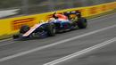 Pebalap Manor Racing asal Indonesia, Rio Haryanto, memacu mobilnya saat latihan bebas kedua di Sirkuit Albert Park, Australia, Jumat (18/3/2016). Catatan waktu Rio masih berada di bawah rekan setimnya, Pascal Wehrlein. (Reuters/Jason Reed)