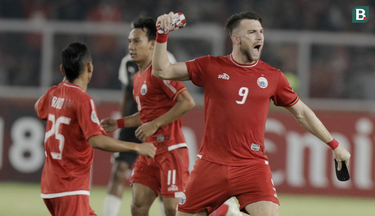 Striker Persija Jakarta, Marko Simic, melakukan selebrasi usai mencetak gol ke gawang Home United pada laga Piala AFC di SUGBK, Jakarta, Selasa (15/5/2018). Persija takluk 1-3 dari Home United. (Bola.com/M Iqbal Ichsan)