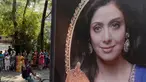 Gambar bintang Bollywood Sridevi Kapoor terlihat di luar kediamannya di Mumbai, India, Senin (26/2). Jenazah Sridevi yang meninggal pada 54 tahun karena serangan jantung di Dubai, Uni Emirat Arab akan diterbangkan kembali ke India. (PUNIT PARANJPE/AFP)