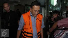 Tersangka kasus dugaan suap penghentian penanganan perkara korupsi PT Brantas Abipraya di Kejati DKI Jakarta, Sudi Wantoko usai menjalani pemeriksaan di Gedung KPK, Jakarta, Rabu (13/4/2016). (Liputan6.com/Helmi Afandi)