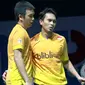 Ganda putra Indonesia Hendra Setiawan/Mohammad Ahsan mengantongi kemenangan pertama di penyisihan Grup A BWF Dubai World Superseries Finals 2015, Rabu (9/12/2015). (Liputan6.com/Humas PP PBSI)