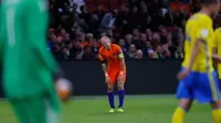 Pemain timnas Belanda, Arjen Robben bereaksi pada laga terakhir babak penyisihan Grup A Piala Dunia 2018 zona Eropa melawan Swedia di Amsterdam Arena, Rabu (11/10). Meski mengalahkan Swedia 2-0, Belanda tetap gagal melaju ke Piala Dunia. (AP/Peter Dejong)
