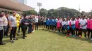 Ketua Umum PSSI, Erick Thohir memberikan sambutan di depan siswa Papua Football Academy setelah coaching clinic bersama legenda Borussia Dortmund di Stadion Madya, Senayan, Jakarta, Jumat (08/09/2023). (Bola.com/Bagaskara Lazuardi)