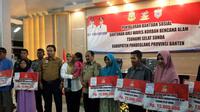 Para perwakilan keluarga korban Tsunami Selat Sunda yang mendapatkan bantuan dari Kemensos (Liputan6.com / Nefri Inge)