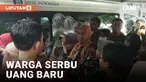 Layanan penukaran uang baru yang digelar Bank Indonesia (BI) di Kantor Kecamatan Karanglewas, Banyumas, Jawa Tengah, diserbu warga. Warga rela jauh-jauh datang dan antre untuk mendapatkan uang pecahan baru.