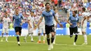 Pemain Uruguay, Edinson Cavani (tengah) merayakan golnya ke gawang Rusia pada laga grup A Piala Dunia 2018 di Samara Arena, Samara, Rusia, (25/6/2018). Uruguay menang 3-0. (AP/Martin Meissner)