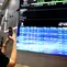 Karyawan memfoto layar pergerakan IHSG, Jakarta, Rabu (3/8/2022). Indeks Harga Saham Gabungan (IHSG) pada perdagangan di Bursa Efek Indonesia, Rabu (3/08/2022), ditutup di level 7046,63. IHSG menguat 58,47 poin atau 0,0084 persen dari penutupan perdagangan sehari sebelumnya. (Liputan6.com/Angga Yuniar)