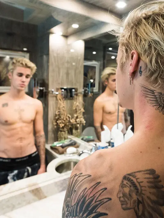 Mengingat pembuatan tato yang menyakitkan, Justin Bieber pasti sangat menyukai hal yang ia lakukan itu. (instagram/justinbieber)