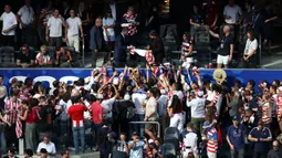 Kedatangan mereka berdua mengundang perhatian para penonton yang hadir di Los Angeles Stadium, Inglewood, Amerika Serikat, Sabtu (13/06/2026) dini hari WIB. (AFP/Getty Images/Harry How)